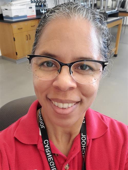 Headshot of teacher in classroom